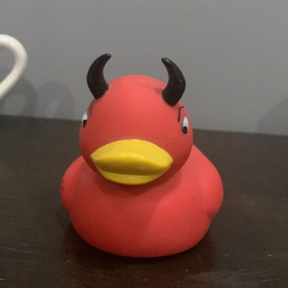 A collection of rubber ducks. - Picture 1 of 8